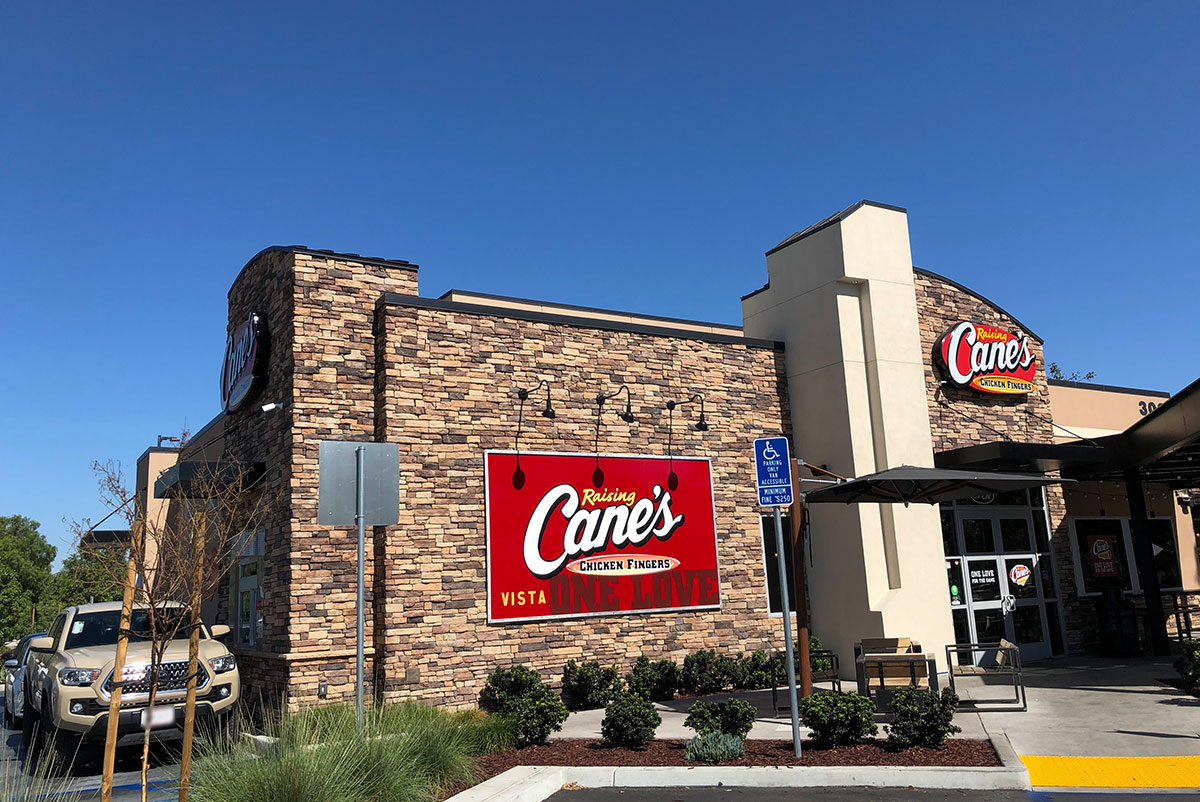 This image displays Neighborhood Raising Cane's Chicken Fingers image in Vista View Apartments.